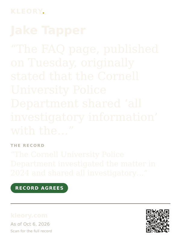 Black tee with the Jake Tapper card on the front
