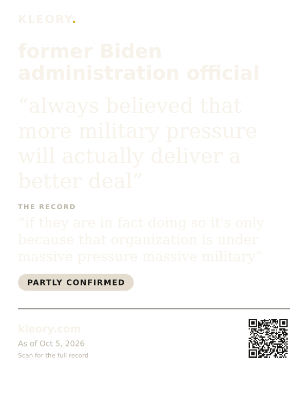 Black tee with the former Biden administration official card on the front